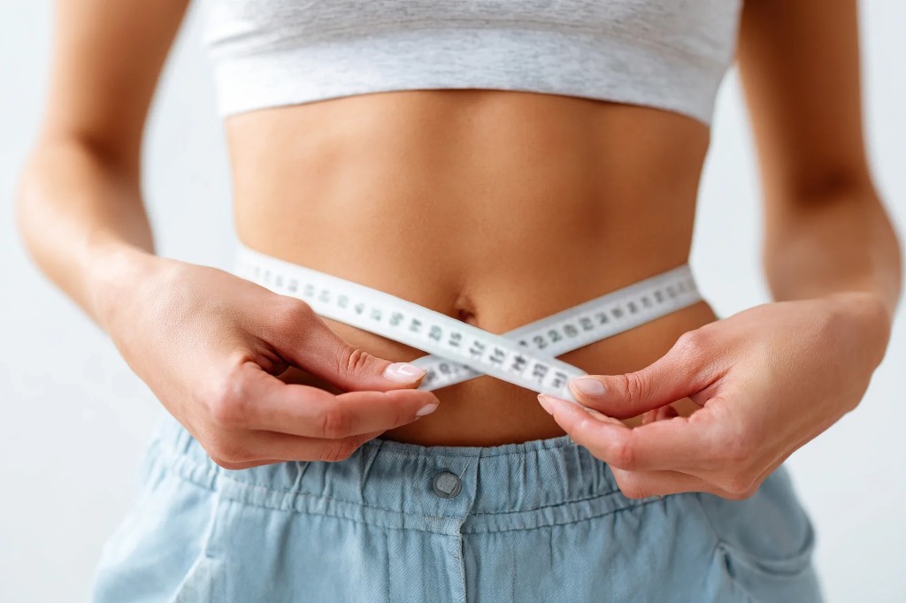 Measuring tape around the waist